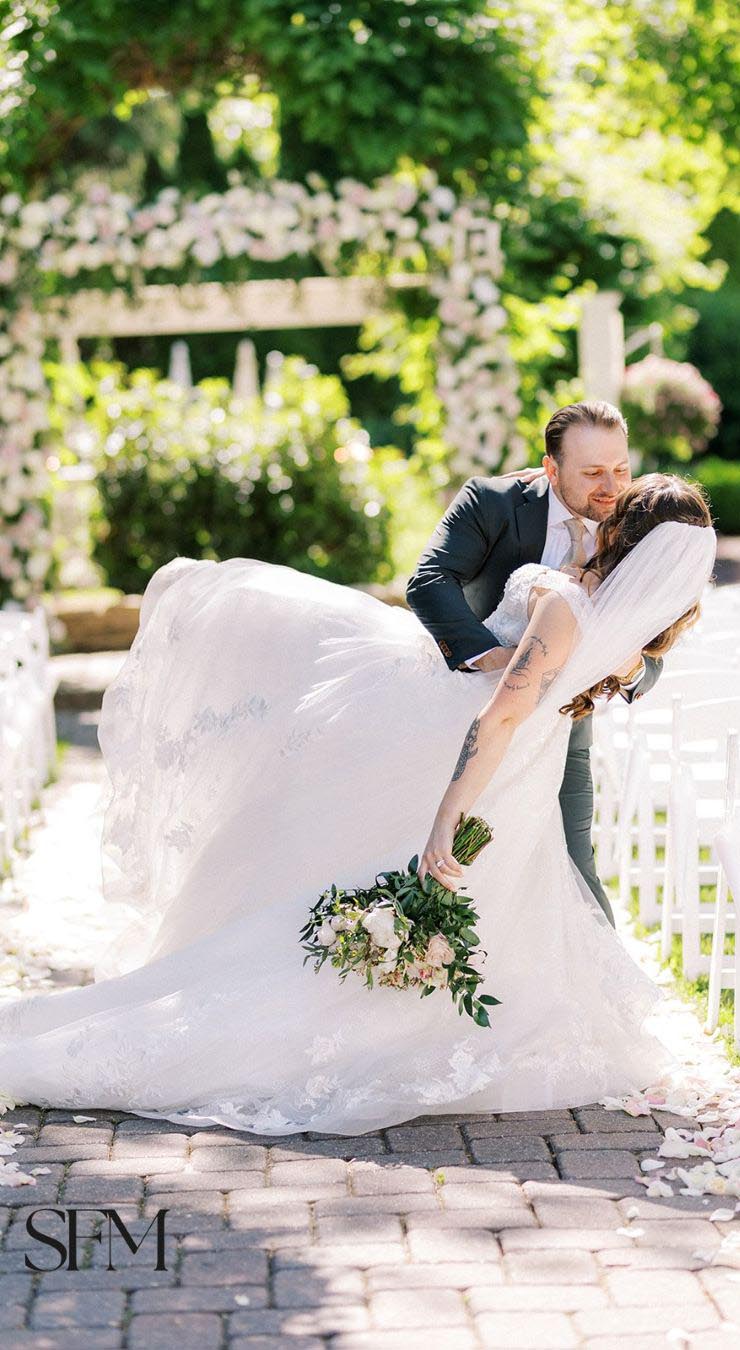 Bride and groom kissing 