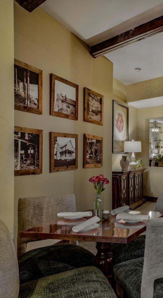 Pictures on wall and dining table at restaurant
